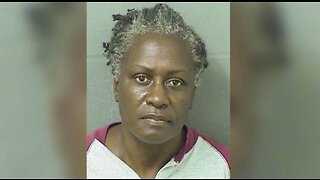 Woman charged with throwing hot water on worker