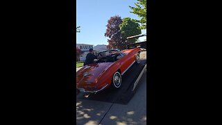 Loading classic Corvette letting customer film