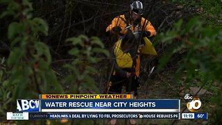 Woman rescued from flood water