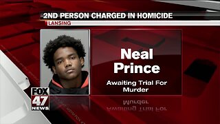 UPDATE: Second person charged in Lansing murder