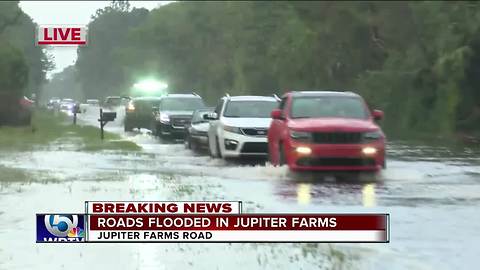 Roads flooded Friday morning in Jupiter Farms