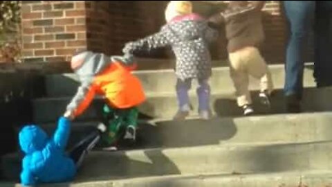 Children fall from steps like dominoes