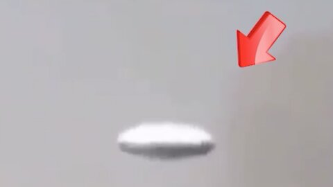White saucer-shaped UFO spotted in the sky above [Space]