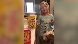 Dog Interrupts Little Girl’s Banana Pudding Recipe