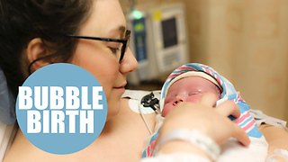 Baby is born with her head encased in the unbroken amniotic sac