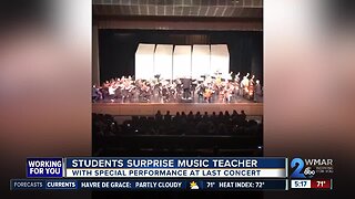 Students surprise music teacher with special performance at final concert