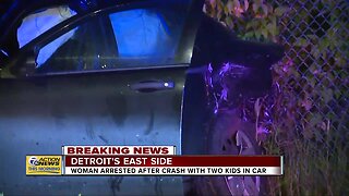 Woman arrested after crash with two kids in car in Detroit