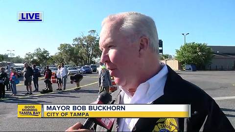 Mayor Buckhorn helps church hand out 3,000 turkeys on Day of Thanks