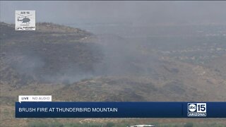 Brush fire burning on Thunderbird Mountain