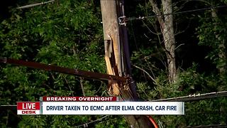 Car crashes into power pole, catches fire in Elma