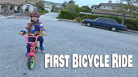 Little Boy's First Bicycle Ride
