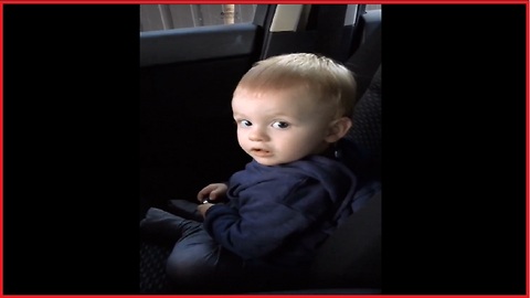 Baby learning to drive car
