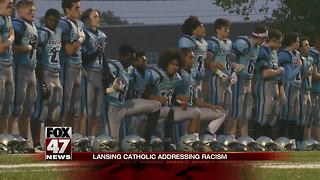 Lansing Catholic football players kneeling see some results