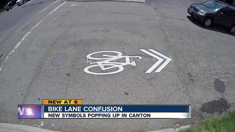They look like bike lanes, but they're not: What's a sharrow?
