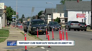 Temporary curb 'bump-outs' installed on Abbott Road as part of pilot program for major infrastructure project