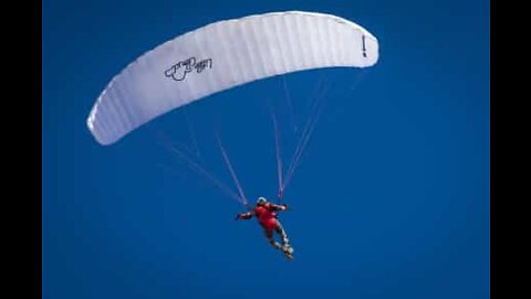 Paraglider carries out awesome infinity tumbles