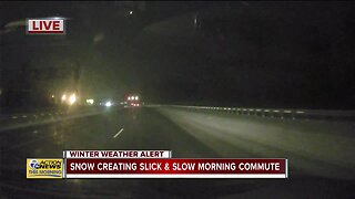 Snow creating slick and slow morning commute