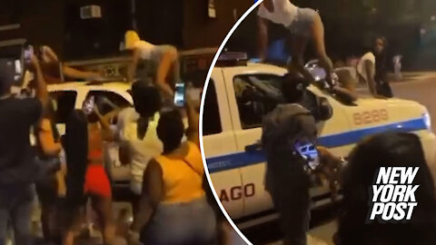 The Chicago Police Department is investigating a video that shows three females twerking on top of a patrol car.