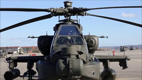 AH-64D Apache helicopters take off from Storck Barracks