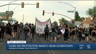 More than 100 people march near downtown Tucson