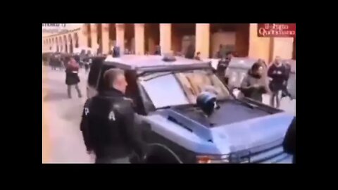 Italian Police Chief Throws Off Helmet In Disgust Of His Orders