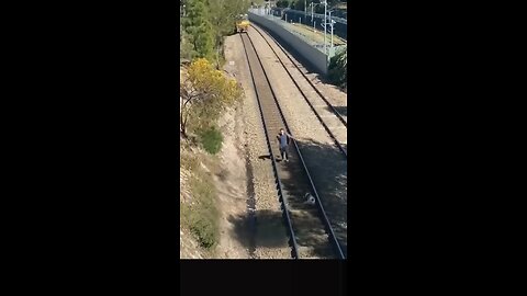 Man did this to dog seen on live train track