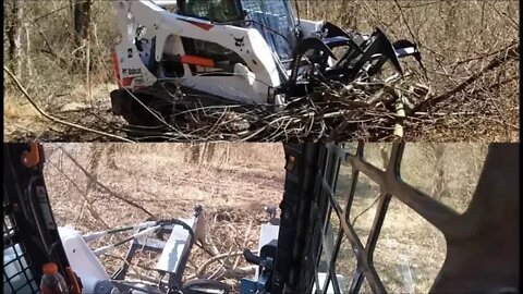 Bobcat T650 skid steer clearing trails with Root Grapple at Kapper Outdoors