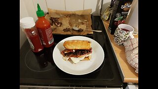 Easy satisfying toasted sandwich. Baguette, cheese, sausage, bacon, mushrooms, egg and ketchup
