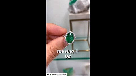 Custom oval cut dark vivid green oval emerald and VS diamond halo platinum engagement ring