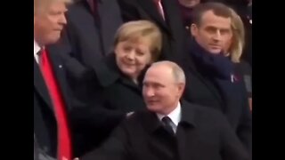 2018: Putin shaking hands with Merkel and Trump but ignoring Macron