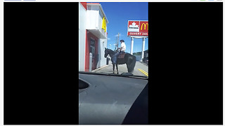 Man on horse struggles at McDonald's drive-thru