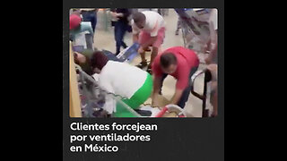 Personas se pelean por conseguir ventiladores en una tienda de Guanajuato, México