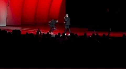The Clearest View Yet Of Dave Chappelle Getting Tackled On Stage
