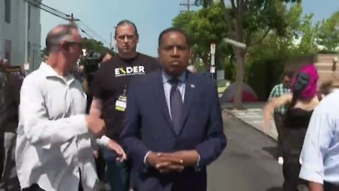 Masked Liberal Monkey Attacks Larry Elder Throwing Eggs and Punches