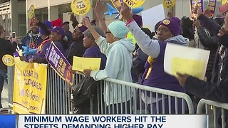 Minimum wage workers hit the streets to demand higher wages