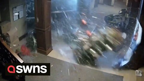 Terrifying moment tornado blows off front door of Kentucky bank