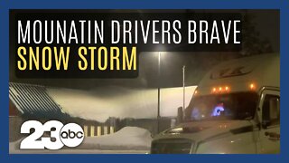 California drivers brave the Sierra Nevada during snow storm