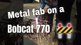 fabrication on a bobcat ( made steel vent covers )