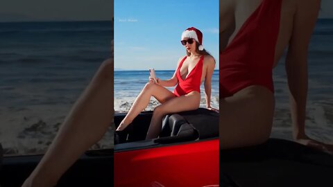 Woman in Santa Hat and Bathing Suit Posing on Top of Car #billionaire #car #hotgirl #ytshorts