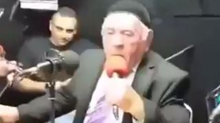 Watch old man signing a happy song