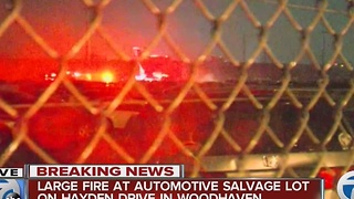 Large fire at automotive salvage lot in Woodhaven