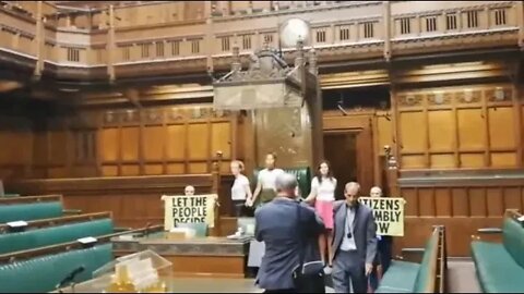 Extinction Rebellion superglue themselves onto the Speaker’s Chair in the UK House of Commons