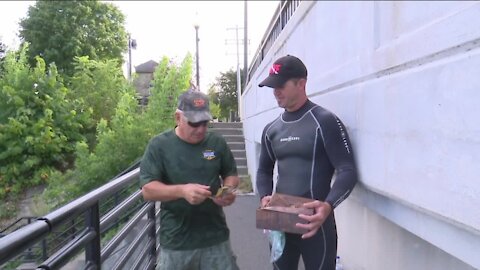 Marinette diver finds man's stolen items in Menominee River a year after robbery, locates owner