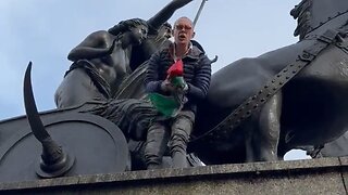 Based British Patriot Rips The Palestinian Flag Off Of A London Statue