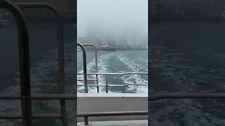 Foggy ferry departure