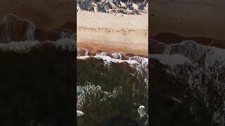 Birds eye view of waves at a beach