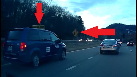 Passenger van almost runs off road trying to merge