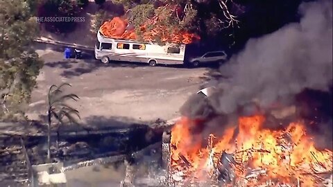 Firefighters battle brush fire that damages multiple homes in San Bernardino, California | NE