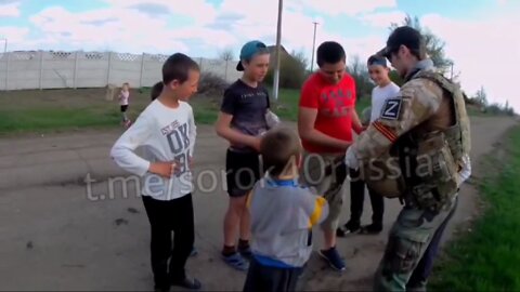 Russian "Vityaz" soldier and Russian children of Novorossiya