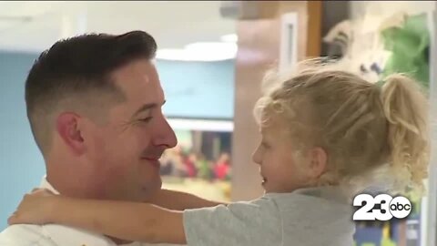 Dad surprises kids after a 9-month deployment